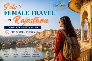 Solo female traveler overlooking Jaipur cityscape in Rajasthan with complete safety guide for women in 2026 banner design